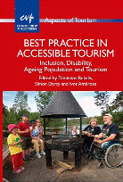 Image of the front cover of Best Practice in Accessible Tourism, with the title in white on a red background and a photo showing a group of people seated around a barbecue 