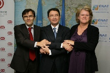 Image showing the three Cooperation Agreement signatories shaking hands