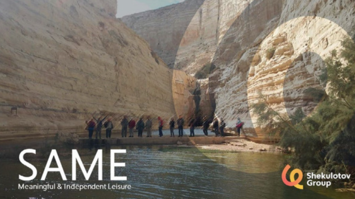 people walking in a natural canion
